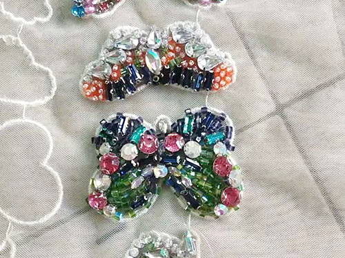手工钉珠工艺服装设计应用
